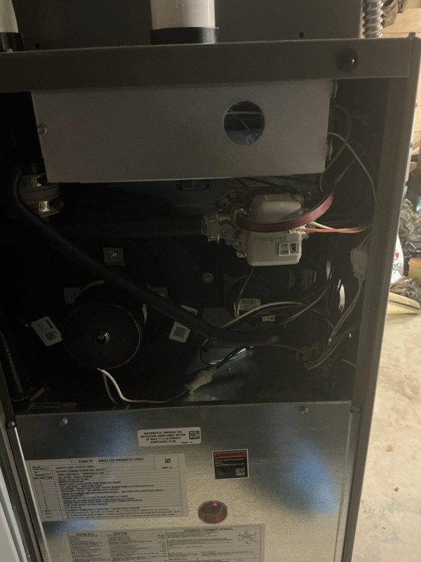Completed scheduled MVP heating maintenance visit on 7-year-old furnace system. Performed comprehensive inspection of heating unit, including examination of blower motor assembly, condensate drainage system, pressure switch components, and all electrical connections throughout the control panel. Verified proper operation of all internal mechanical components, checked wire connections and terminals on the main control board, and documented equipment condition through photographic records. All systems found operating within normal parameters with no issues identified requiring immediate attention.