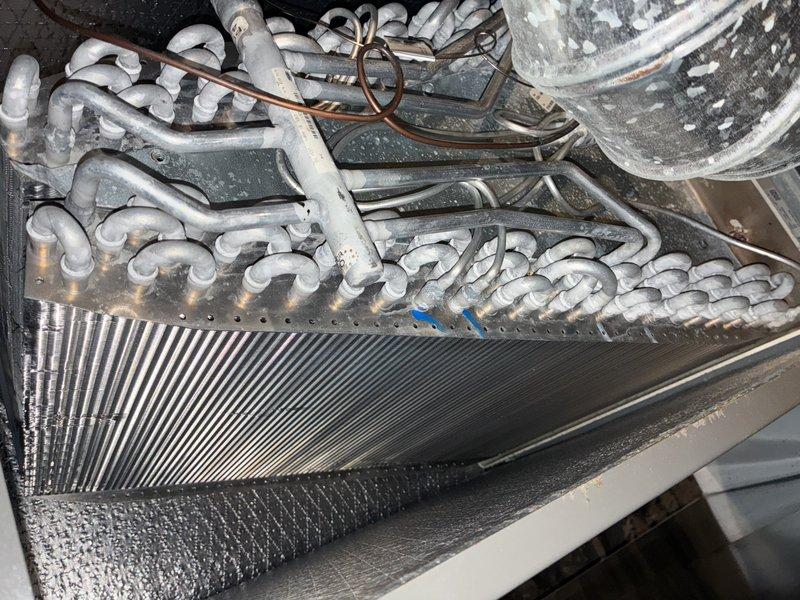 Completed comprehensive furnace tune-up on 6-year-old system including inspection of control board, electrical connections, and all safety components. Verified proper operation of evaporator coil assembly, refrigerant lines, and heat exchanger; all components found to be in good working condition with normal operational wear.