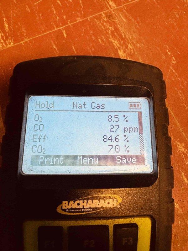 Responded to service call for AC unit making grinding noise during startup. Inspected all three AC units on property—two 2-year-old Lennox units and one 2-year-old Carrier unit. Diagnosed grinding noise issue, likely caused by blower motor bearing wear or debris in blower assembly. Performed pre-season inspection on 12-year-old Carrier furnace in preparation for winter operation. Conducted combustion analysis using diagnostic equipment, recording oxygen levels at 8.5%, carbon monoxide at 27 ppm, efficiency at 84.6%, and carbon dioxide at 7.0%. All readings within acceptable parameters for safe furnace operation. Documented findings with photos for service records.