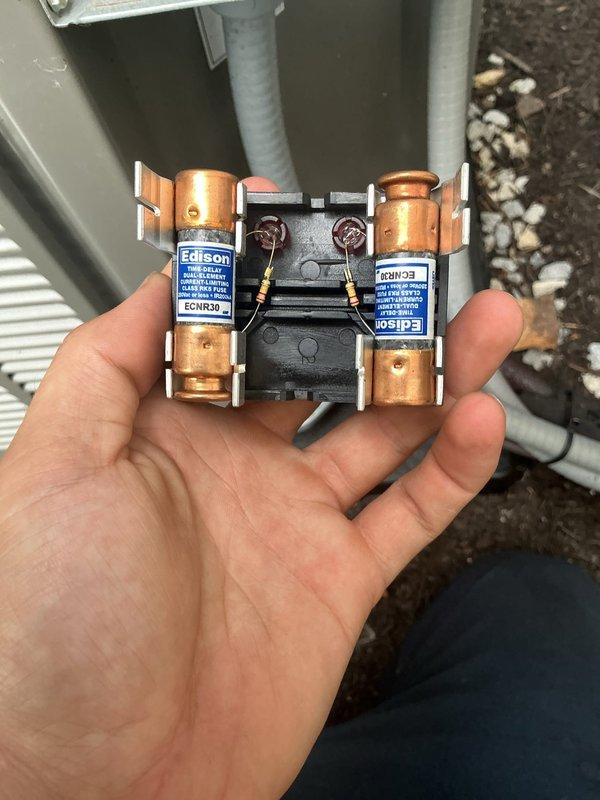 Completed MVP recurring cooling maintenance visit on residential HVAC system. Inspected and tested electrical components including disconnect panel, contactor, and Edison brand fuses, which were found to be in good condition with no signs of corrosion or damage. Performed amperage readings using clamp meter, recording 0.55 amps on measured circuit. All electrical connections, wiring, and capacitor verified secure and functioning properly. System operational and ready for continued service.