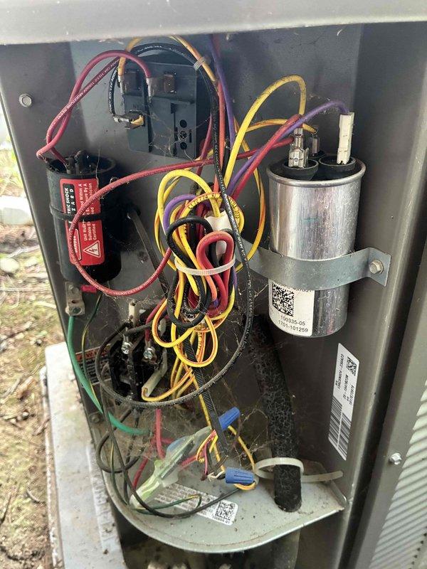 Completed MVP cooling and heating maintenance service at residential property. Performed comprehensive system inspection with electrical diagnostics using multimeter to verify proper voltage and amperage readings across components. Accessed outdoor condensing unit electrical compartment, inspected capacitor, contactor, relay, and control board connections. All electrical components tested within normal operating parameters, wiring connections secure, and system operating efficiently with no deficiencies noted.