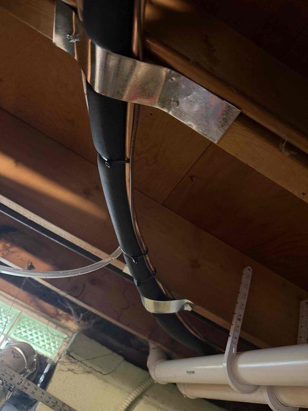 Addressed failed inspection findings on HVAC installation by sealing cold air return, covering filter rack, and replacing undersized support straps with properly rated metal strapping on ductwork per code requirements. Documented corrective measures with photos and submitted for re-inspection approval.