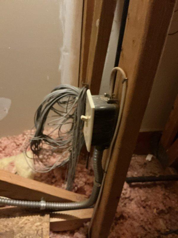 Responded to no cooling call on 9-year-old Ducane air conditioning system with thermostat displaying no power. Diagnosed low voltage power supply issue preventing thermostat operation and system startup. Traced wiring from thermostat through basement to air handler and identified failed transformer supplying 24VAC control voltage to thermostat and system controls. Replaced defective transformer, verified proper voltage output at thermostat terminals, and confirmed system restored to normal operation with adequate cooling capacity.