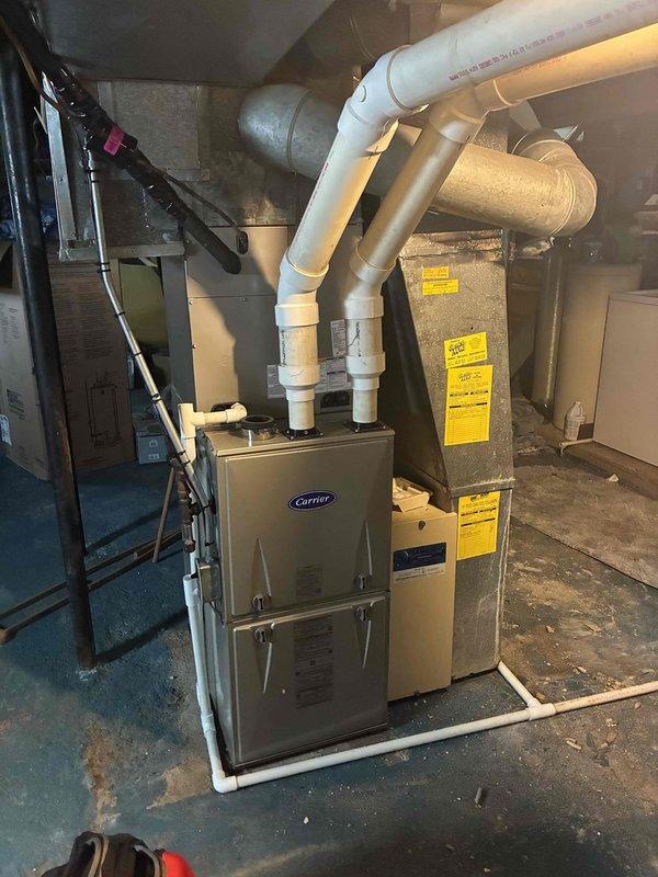 Completed scheduled tune-up service on 3-year-old Carrier furnace and humidifier system located in basement. Replaced air filter and humidifier filter as requested, performed visual inspection of all system components including ductwork, venting, and electrical connections. System operating within normal parameters with no issues identified during service visit.