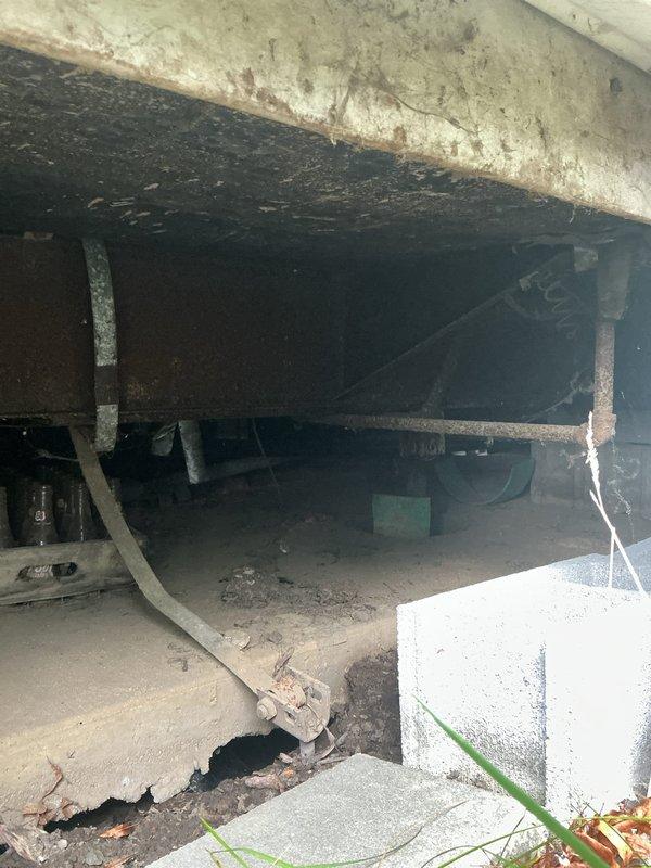Conducted site assessment of crawl space for water pipe heat trace cable installation. Inspected existing plumbing infrastructure, noting corroded horizontal pipe requiring freeze protection. Evaluated structural access points, concrete block foundation, and clearances for proper heat tape routing. Documented current conditions of exposed piping, deteriorated insulation, and crawl space environment. Provided detailed quote for heat trace cable installation including materials and labor requirements to prevent freeze damage to water supply lines.