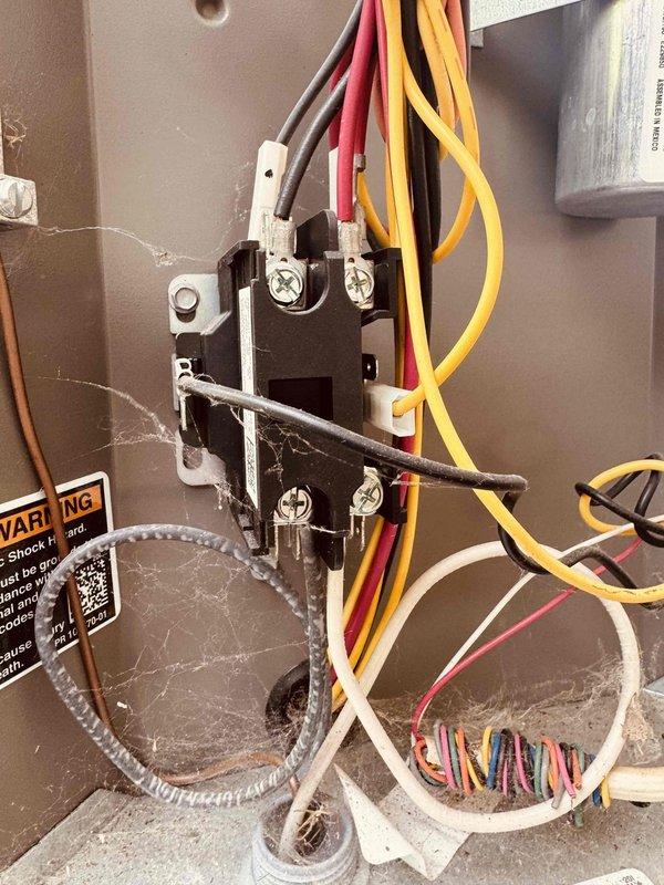Completed comprehensive tune-up service on 4-year-old Lennox AC and furnace system. Inspected electrical contactor, capacitor, and all wire connections within control panel; cleaned accumulated dust and debris from blower assembly and housing. All components tested and found operating within normal parameters; system running efficiently with no deficiencies noted.
