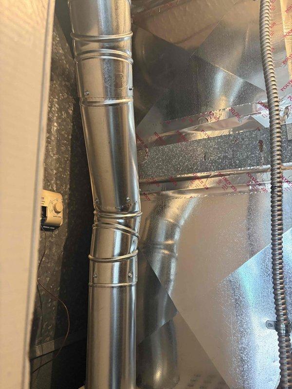 Completed furnace installation with air scrubber integration, reusing existing filter components and removing humidifier from system. Installed new ductwork connections in attic space with proper insulation and mounted safety detector, ensuring all components meet code requirements and system operates efficiently.