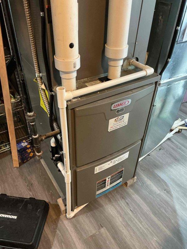 Diagnosed failed induced draft motor on Lennox furnace due to shattered blower wheel within the motor housing. Ordered replacement motor assembly, received parts, and completed installation to restore proper furnace operation.