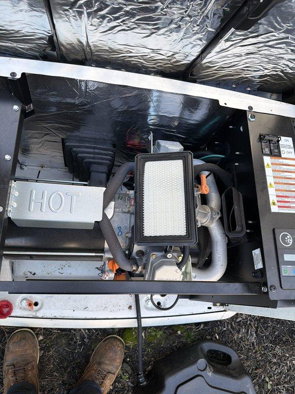 Completed scheduled maintenance on a two-year-old generator system, including inspection of internal components, air filter assessment, and battery testing. Battery diagnostic testing confirmed good operational status with proper CCA ratings, and all electrical connections and safety systems were verified to be functioning within manufacturer specifications.