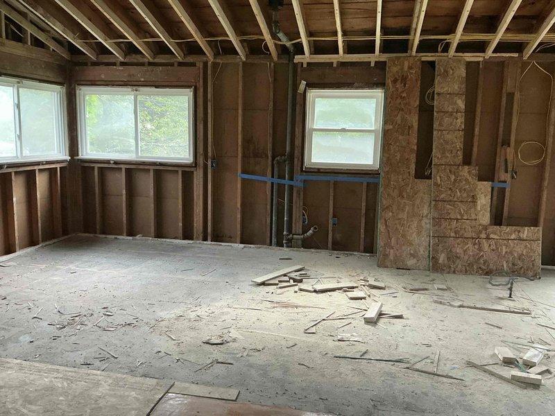Completed on-site ductwork estimate for residential property undergoing full renovation with structure down to studs. Assessed existing HVAC system configuration and determined feasibility of retaining current furnace and air conditioning unit while designing new ductwork layout to accommodate the gutted interior spaces. Evaluated framing structure, ceiling joist accessibility, and available pathways for supply and return duct runs throughout main floor and upper level attic space to ensure proper airflow distribution and system efficiency for the renovated residence.