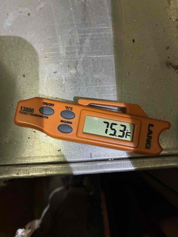 Completed recurring heating maintenance visit, performing standard system inspection and testing. Inspected blower wheel assembly and verified proper operation, noting minor dust accumulation on blower blades and housing. Measured supply air temperature at 75.3°F using calibrated digital thermometer. Installed plastic protective cover over outdoor air conditioning unit as requested by customer for winter season protection.