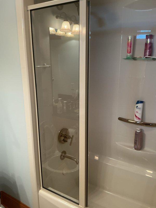 Responded to customer complaint of excessively hot water temperature from shower fixture. Inspected and adjusted the temperature control valve on the tub/shower assembly to regulate maximum hot water output. Tested water temperature after adjustment to ensure safe and comfortable water delivery, resolving the scalding water issue.