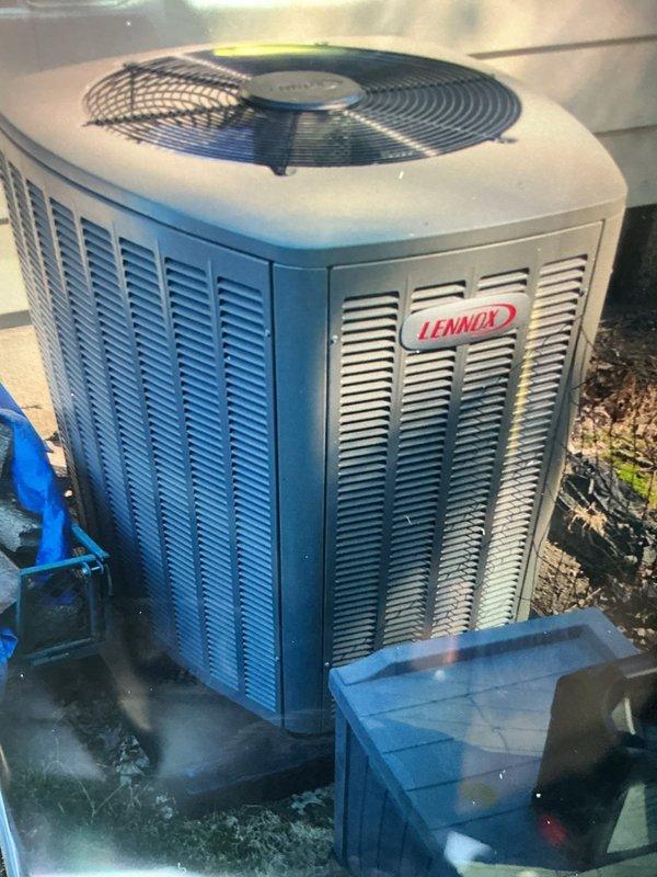 Responded to service call for Lennox air conditioning system experiencing loud noise during unit cycling and thermostat short cycling issues on a four-month-old installation. Upon inspection of the outdoor condensing unit and indoor air handler, conducted diagnostic evaluation of electrical components, thermostat wiring, and mechanical operation. Documented equipment condition through photographic evidence showing the outdoor unit installation and interior evaporator coil assembly. System evaluated for proper startup and shutdown sequences to identify source of noise concerns and thermostat communication issues.