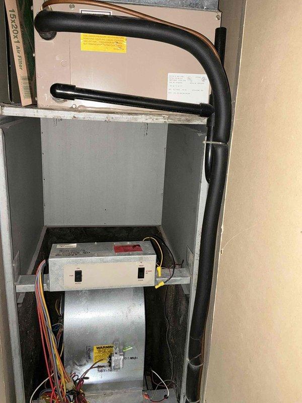 Completed estimate for electric furnace replacement in mobile home with 43-year-old system. Assessed existing HVAC installation including air handler, blower assembly, ductwork, and electrical connections to determine parts availability and replacement requirements. Documented current system configuration with filter specifications (15x20x1) and heating/cooling switch location for replacement planning.