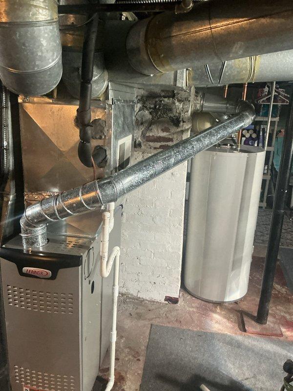 Completed warranty coil replacement on Lennox furnace system in basement mechanical room. Installed new evaporator coil with 3 feet of 3/8" x 3/4" lineset as required. System tested and operational upon completion.