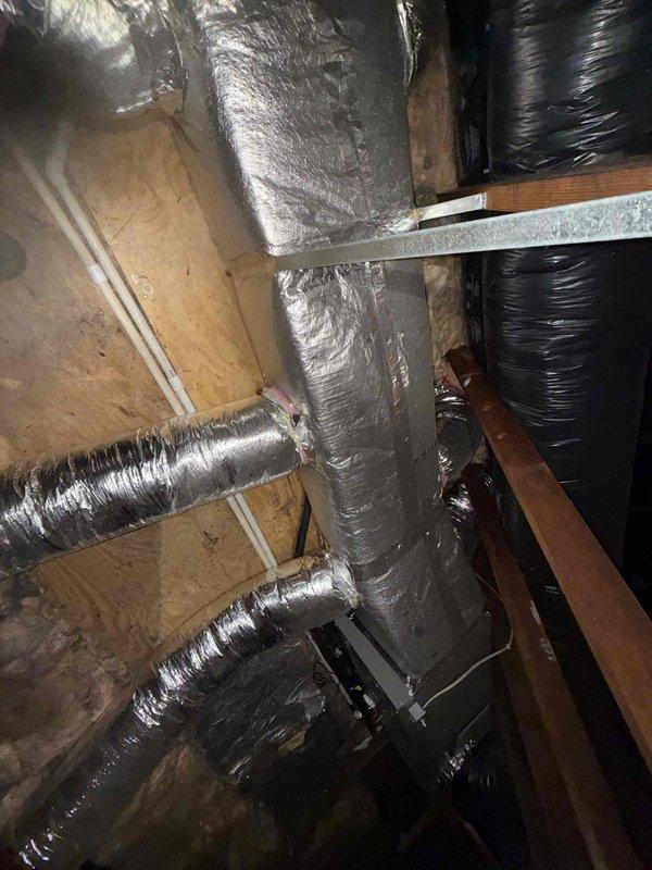 Replaced defective condenser coil under warranty in attic-mounted HVAC system. Accessed unit through attic crawl space, removed failed coil, and installed new replacement component. System tested and confirmed operational upon completion, with all ductwork connections and insulation properly maintained throughout the four-hour repair process.