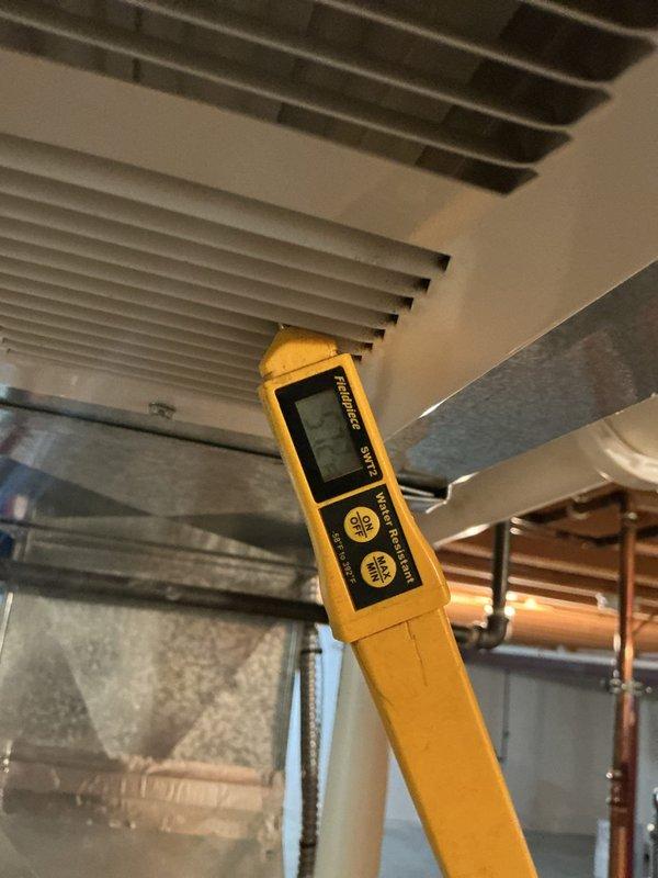 Performed comprehensive inspection and diagnostic testing of 14-year-old furnace system located in basement as part of pre-purchase home evaluation. Utilized digital diagnostic tools and clamp meter to verify electrical performance, measuring voltage at 26V and assessing overall system functionality. Conducted thorough examination of blower unit, air handler components, ductwork, and refrigerant lines to ensure proper operation and identify any maintenance concerns for the prospective homeowner.