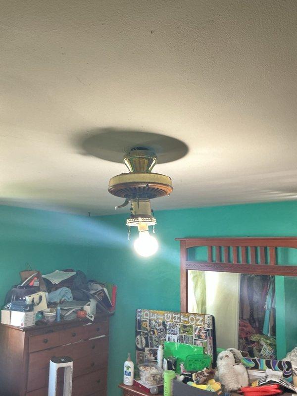Installed customer-supplied ceiling fan with integrated light fixture in bedroom, including electrical connections at ceiling junction box, mounting hardware installation, and blade assembly. Verified proper operation of fan motor and lighting element, confirmed secure mounting and electrical safety compliance.