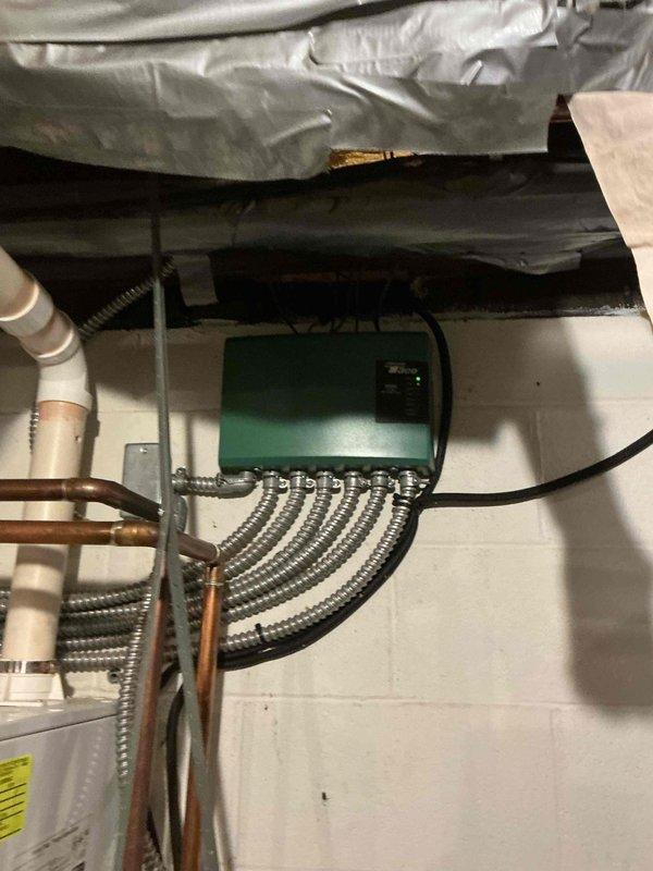 Completed recurring maintenance visit for mini-split and hydronic heating system. Inspected four-zone circulator pump manifold assembly with brass fittings and copper distribution piping, verified proper operation of all pump units and associated controls, and documented system condition through photographic records. All equipment found operating within normal parameters with no immediate service needs identified.