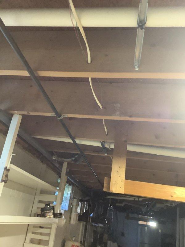Completed installation of new 90% efficiency furnace system with associated flue venting. Installed Lennox condensing unit on exterior pad with proper refrigerant line routing and electrical disconnect, along with new ductwork and supporting infrastructure in exposed ceiling space. All components tested and operational upon completion.