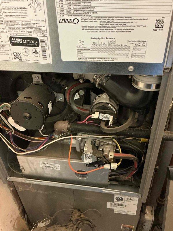 Responded to service call for AC system not blowing air with outdoor unit running but furnace struggling to start. Performed diagnostic inspection of 4-year-old Lennox system and completed tune-up service. Inspected blower motor, gas valves, burner assembly, and ductwork connections. Verified proper airflow restoration through supply plenum with 16x20x1 filter specification. System tested and confirmed operational with adequate airflow and proper unit cycling.