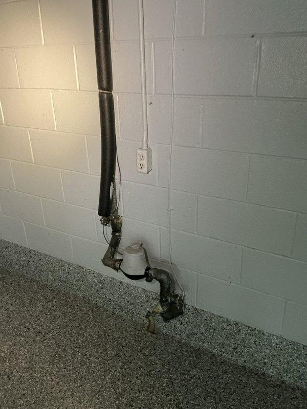 Responded to service call for slow draining in main bathroom. Performed main drain cleanout to address drainage issue and restore proper flow through the plumbing system. Inspected basement plumbing infrastructure including vertical drain lines, PVC piping configuration, and main drain access points to ensure complete clearance and verify system functionality.
