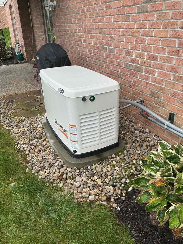Performed scheduled maintenance on a 3-year-old Generac residential standby generator. Conducted comprehensive system diagnostics using electronic testing equipment, verified battery condition showing good status at 85% charge with proper voltage readings. Inspected unit operation, confirmed green indicator light status, and validated all system functions are operating within normal parameters.