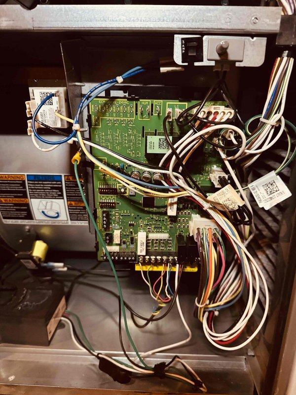 Completed MVP recurring cooling maintenance visit. Performed comprehensive system inspection including blower assembly and control board examination. Blower wheel showed moderate dust accumulation on blades but maintained structural integrity with proper shaft connection. Inspected control panel housing containing multiple circuit boards with all electronic components, wiring connections, and safety controls verified to be secure and functioning properly. All system components operating within normal parameters.
