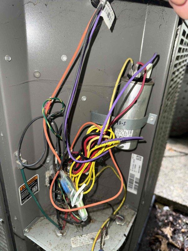 Completed routine maintenance on 15-year-old air conditioning system. Performed comprehensive inspection of all major components including blower motor assembly, control boards, electrical connections, and wiring. Verified proper operation of dual circuit boards, checked all wire connections and terminals for secure attachment, and inspected capacitor mounting. All components found to be in operational condition with no immediate repairs required.