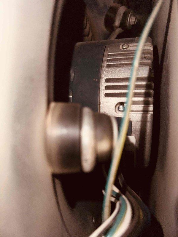 Responded to no-cool call with AC unit experiencing ice buildup on evaporator coil. Upon inspection of Ducane system, identified blower motor assembly with belt-driven configuration showing signs of reduced airflow across coil. Verified blower motor operation, checked belt tension and condition, and inspected pulley alignment. Addressed airflow restriction causing freezing condition, restored proper system operation, and confirmed adequate cooling performance upon completion.