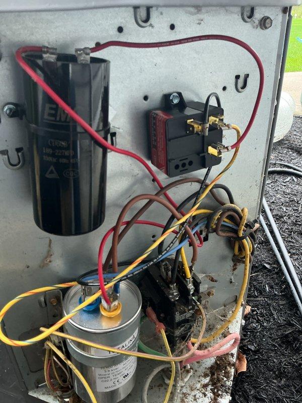 # HVAC Service - A/C

Responded to service call for 9-year-old air conditioning unit operating with abnormal noise. Upon inspection of outdoor condenser unit, identified failed capacitor as source of operational issue. Removed access panel and performed electrical component diagnostics. Replaced defective dual-run capacitor with new MARS replacement unit. Verified all electrical connections were secure and properly terminated. Cleaned accumulated debris from electrical compartment and components. Tested system operation following repair—unit now running quietly with normal sound levels and proper electrical readings. System returned to full operational status.
