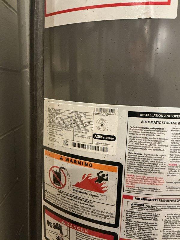Responded to service call for tanked water heater issue at residential property. Upon arrival, inspected Rheem Performance Plus model water heater unit installed in basement utility room. Evaluated water heater operation, connections, and safety components including pressure relief valve, copper supply lines, and red-handled shut-off valve. Verified proper venting and ductwork configuration. Assessed unit specifications, energy efficiency ratings, and manufacturer labels for compliance. Documented equipment condition and installation with photographs for service records. All safety warnings and operational parameters were reviewed to ensure system functionality.