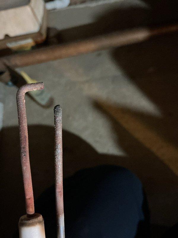 Responded to service call for wall-mounted gas boiler system with seven heating zones experiencing operational issues. Replaced three defective zone valves on the multi-zone manifold assembly; two additional valves continue to exhibit leaking and require further attention or replacement. Troubleshot igniter malfunction on the gas boiler unit. System shows signs of age with visible corrosion on copper piping components throughout the installation.