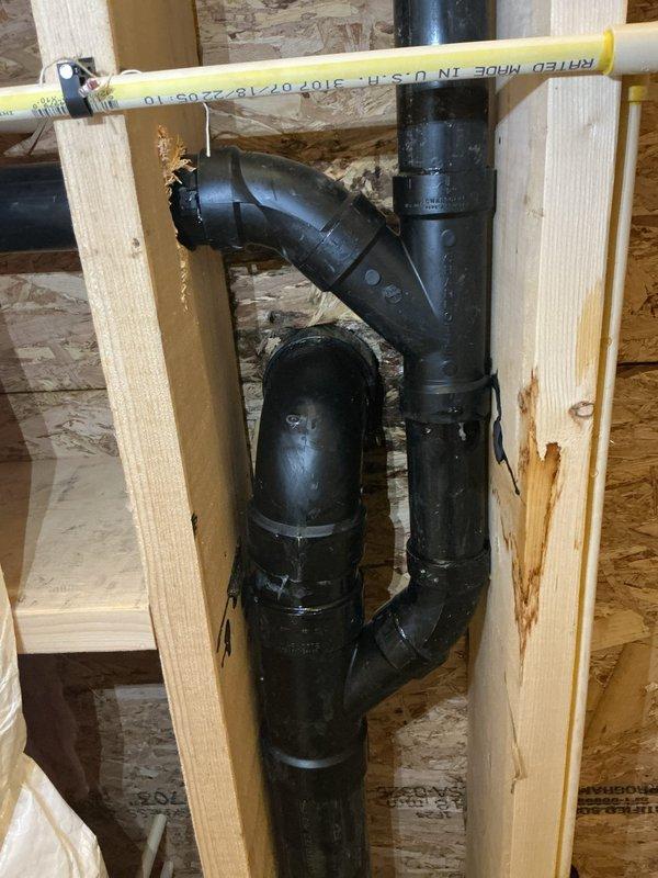 Responded to toilet instability and water leakage at the base. Upon inspection, discovered severely corroded toilet flange with extensive rust damage and mineral deposit buildup, compromising the seal integrity. Removed the existing toilet and replaced the deteriorated flange with new hardware. Installed fresh wax ring seal and properly secured the toilet to the floor using corrosion-resistant closet bolts. Verified all connections were watertight and tested for proper operation and stability.
