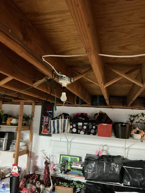 Completed comprehensive lighting upgrade and electrical troubleshooting throughout residence. Installed six 6-inch wafer lights in living room with new single-pole dimmer switch, requiring upgrade from single-gang to two-gang box. Removed existing hallway light fixture and replaced with 6-inch wafer light controlled by new dimmer switch. Replaced kitchen sink can light with 8x8 fixture. Performed two hours of diagnostic troubleshooting to identify and repair non-functioning switched outlet in family room following previous device replacements. Removed five closet pull-chain fixtures and installed 6-inch motion sensor wafer lights, including installation of old work boxes where necessary to accommodate proper fixture placement. Work required drilling access holes and selective drywall cutting for wire routing and box installations. All customer-provided fixtures installed per manufacturer specifications with proper electrical connections and switch controls.