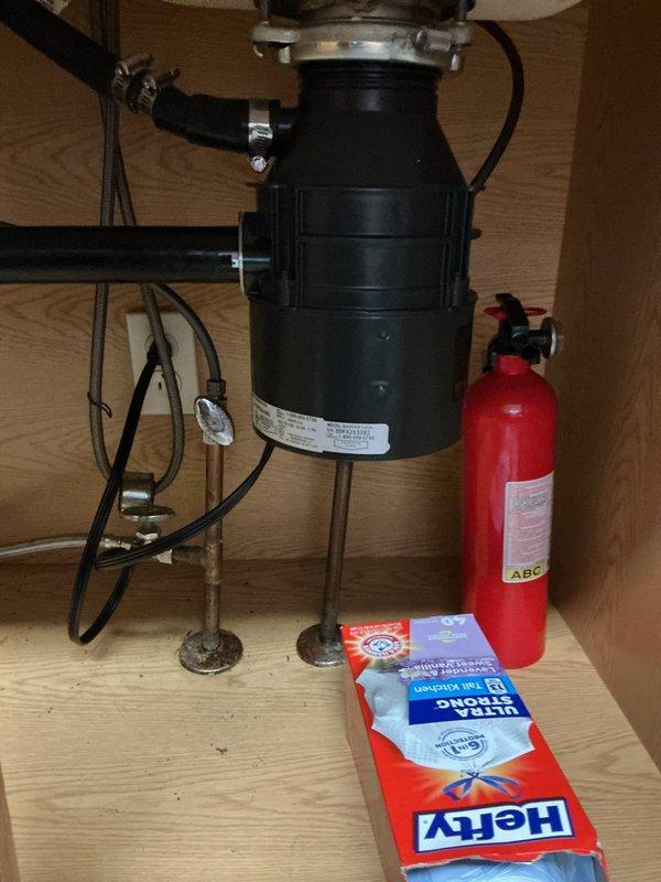 Completed replacement of garbage disposal unit, sink strainer basket with mounting nut, and Delta faucet cartridge. Removed existing disposal and installed new unit with proper electrical connections and drain assembly. Replaced worn strainer basket and secured with new mounting hardware to eliminate leaks at sink drain connection. Extracted and replaced faulty Delta cartridge to restore proper water flow and temperature control at faucet. All components tested for proper operation and verified leak-free connections throughout drainage and water supply systems.