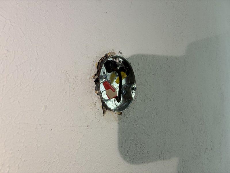 Responded to service call for non-functioning water heater that required electrical verification following previous unsuccessful repair attempt. Inspected electrical panel, junction box, and associated wiring in utility room to diagnose power supply issues affecting water heater operation. Verified electrical connections and circuit integrity to mechanical equipment, documented existing conditions with photos showing panel configuration and utility room electrical infrastructure.