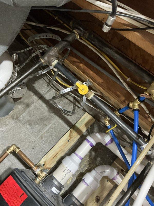 Completed comprehensive site assessment for whole home standby generator installation at residential property with no existing backup power system. Evaluated current electrical service infrastructure by inspecting main electrical panel and documenting existing circuit breaker configuration and load distribution. Assessed available installation locations considering proximity to existing utility connections, fuel source access, and compliance with setback requirements per local code and manufacturer specifications.

Examined basement mechanical area and identified existing plumbing infrastructure including copper supply lines with shutoff valves, drainage systems with PVC trap assemblies, and access points that may impact generator placement and transfer switch routing. Documented current electrical panel capacity and determined requirements for automatic transfer switch integration with existing branch circuit configuration.

Evaluated necessary electrical modifications including dedic