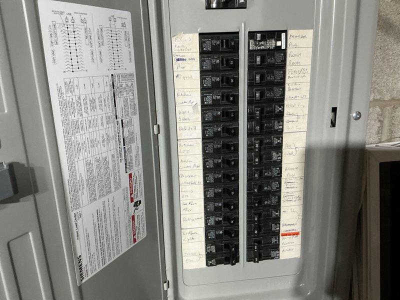 Completed comprehensive site assessment for whole home standby generator installation at residential property with no existing backup power system. Evaluated current electrical service infrastructure by inspecting main electrical panel and documenting existing circuit breaker configuration and load distribution. Assessed available installation locations considering proximity to existing utility connections, fuel source access, and compliance with setback requirements per local code and manufacturer specifications.

Examined basement mechanical area and identified existing plumbing infrastructure including copper supply lines with shutoff valves, drainage systems with PVC trap assemblies, and access points that may impact generator placement and transfer switch routing. Documented current electrical panel capacity and determined requirements for automatic transfer switch integration with existing branch circuit configuration.

Evaluated necessary electrical modifications including dedic
