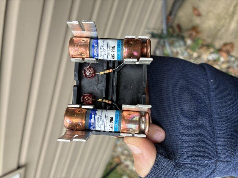 Responded to no-cooling call where A/C unit failed to operate over the weekend. Upon inspection, discovered blown 20-amp FNR fuses in the disconnect panel. Replaced both defective fuses, restored power to the system, and verified proper operation of the air conditioning unit.