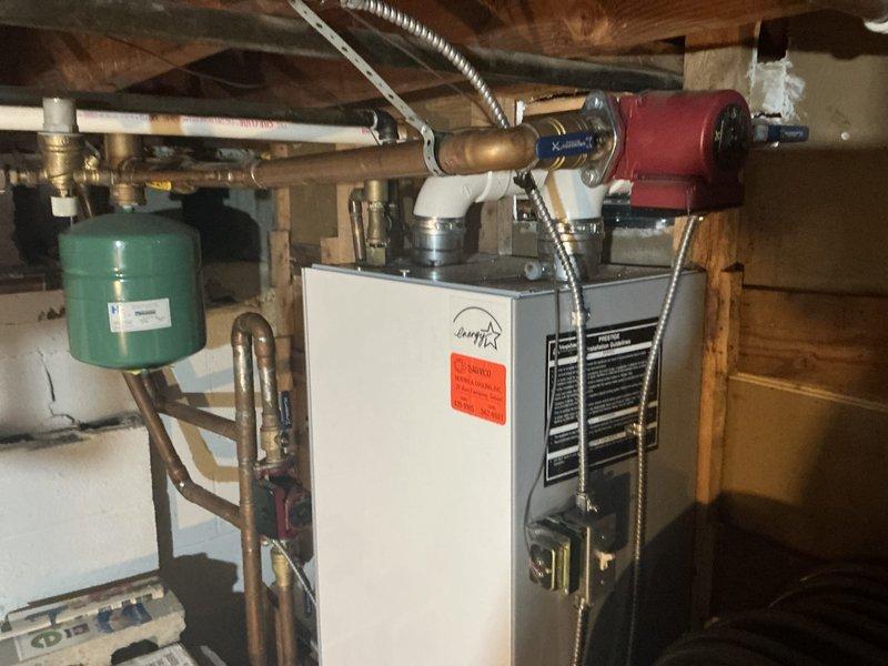 Performed comprehensive estimate on 2009 Triangle Tube boiler system with multi-zone hydronic heating distribution. Boiler manufacturer is out of business with critical components unavailable, including ignitor and maintenance kit required for proper operation. Assessed and quoted replacement of three malfunctioning zone valves on the manifold system controlling individual heating zones throughout the residence.