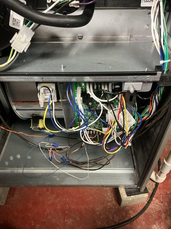 Performed comprehensive preventive maintenance on 11-year-old residential air conditioning system. Conducted thorough inspection of indoor air handler unit, examining all electrical connections, control board functionality, and wiring integrity. Removed access panels to verify proper operation of blower assembly and internal components. Proceeded to outdoor condensing unit where access panel was removed to inspect compressor contactor, capacitor, and all electrical connections. Verified all wire terminations were secure and free of corrosion. Cleaned condenser coil fins and cabinet interior of accumulated debris and dirt. Checked refrigerant pressures and confirmed system operating within manufacturer specifications. All safety controls tested and verified operational. System restored to normal operation with no deficiencies noted.