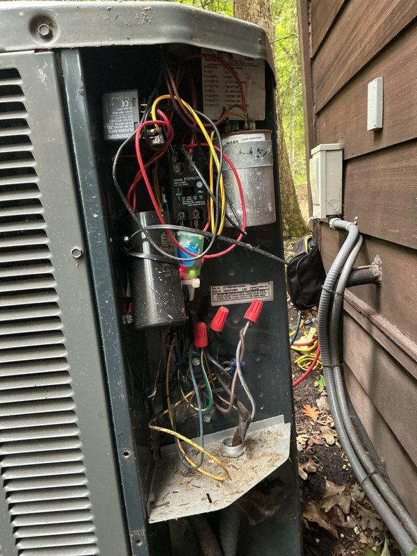 Performed comprehensive preventive maintenance on 11-year-old residential air conditioning system. Conducted thorough inspection of indoor air handler unit, examining all electrical connections, control board functionality, and wiring integrity. Removed access panels to verify proper operation of blower assembly and internal components. Proceeded to outdoor condensing unit where access panel was removed to inspect compressor contactor, capacitor, and all electrical connections. Verified all wire terminations were secure and free of corrosion. Cleaned condenser coil fins and cabinet interior of accumulated debris and dirt. Checked refrigerant pressures and confirmed system operating within manufacturer specifications. All safety controls tested and verified operational. System restored to normal operation with no deficiencies noted.