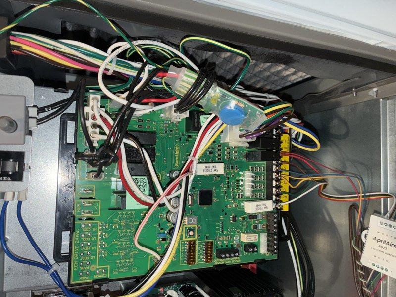 Completed comprehensive heating maintenance on gas furnace system including inspection of control board, wiring harnesses, and condensate drainage components. Verified proper operation of electronic control system with all wire connections secure and circuit board functioning correctly. Confirmed condensate drain line and trap assembly are clear and draining properly to prevent water backup issues.