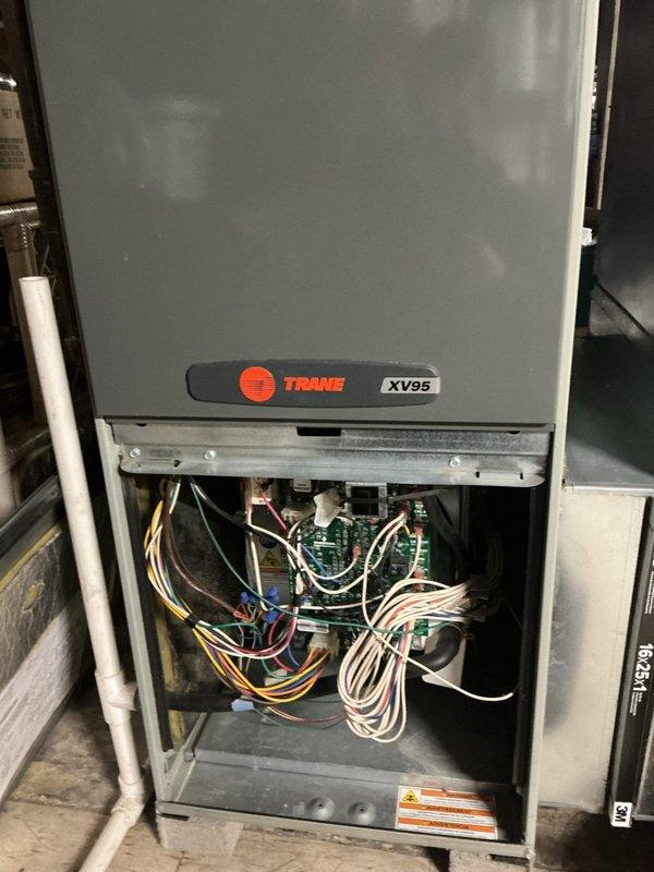 Completed preventive maintenance on 13-year-old ground-level Trane XV95 cooling system. Performed comprehensive inspection of unit's electrical components, wiring, and circuit boards, verifying all connections were secure and functioning properly. Inspected and confirmed proper operation of internal control systems. Verified air filter condition, noting clean Filtrete pleated filter properly installed in ductwork. All components found to be in good working order with no immediate service needs identified.