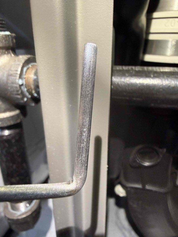 Completed MVP heating maintenance visit and system inspection. Documented significant frost accumulation on refrigerant line indicating potential low refrigerant charge or airflow restriction, and inspected blower wheel assembly which appeared clean and operational with proper blade spacing and configuration.