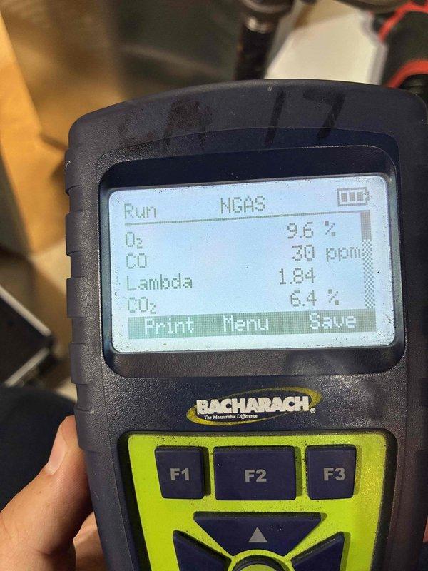 Completed comprehensive heating maintenance on a 9-year-old gas furnace. Performed combustion analysis using Bacharach diagnostic equipment, recording optimal readings of 30 ppm CO, 9.6% O2, 6.4% CO2, and 1.84 Lambda, confirming efficient and safe burner operation. Inspected blower wheel assembly, noting dust and debris accumulation on blades and housing that could impact airflow efficiency if not addressed during future service intervals.