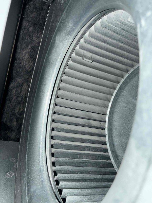 Completed comprehensive heating maintenance on a 9-year-old gas furnace. Performed combustion analysis using Bacharach diagnostic equipment, recording optimal readings of 30 ppm CO, 9.6% O2, 6.4% CO2, and 1.84 Lambda, confirming efficient and safe burner operation. Inspected blower wheel assembly, noting dust and debris accumulation on blades and housing that could impact airflow efficiency if not addressed during future service intervals.