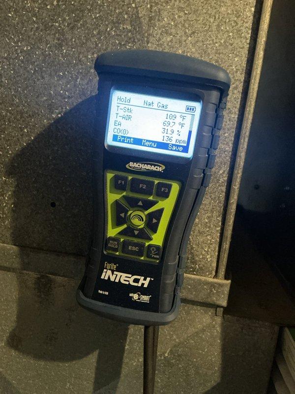 Performed comprehensive tune-up and safety inspection on 17-year-old Goodman gas furnace in preparation for winter heating season. Conducted combustion analysis using Bacharach Fyrite INTECH analyzer, measuring natural gas combustion efficiency at 43% with carbon monoxide levels at 135 ppm and stack temperature of 657°F. Inspected burner assembly and flame sensor, cleaning components as needed to ensure proper operation and system efficiency.