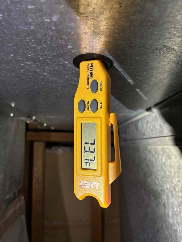 Completed comprehensive cooling maintenance on a 7-year-old air conditioning system. Performed temperature diagnostics on supply ductwork, recording 63.7°F at the plenum, indicating proper system operation and adequate cooling output. Inspected condenser coil, evaporator assembly, refrigerant lines with insulation, and all associated HVAC components including furnace cabinet and humidifier unit. System operating within normal parameters with no deficiencies noted.